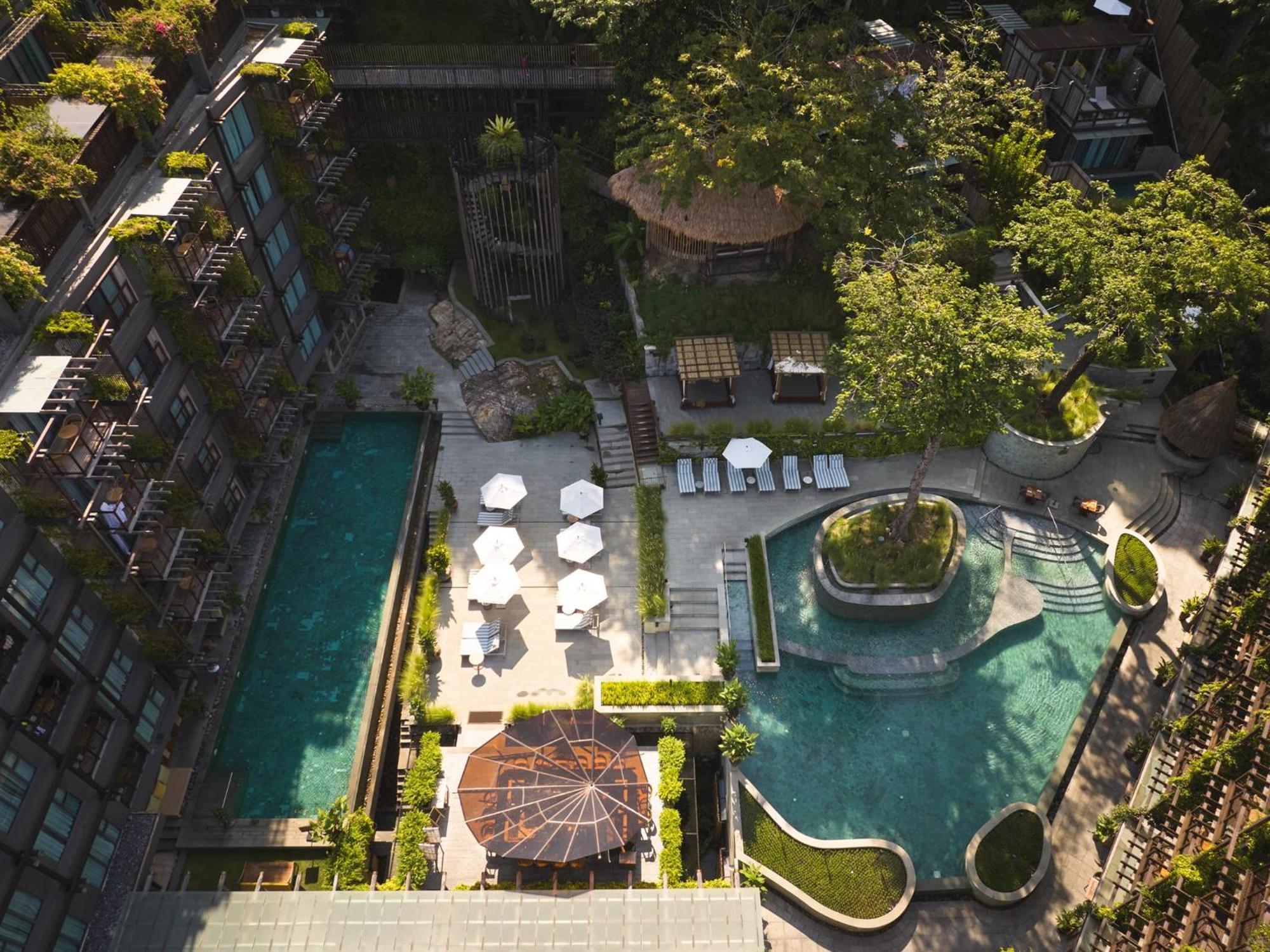 منتجع دينسو Patong المظهر الخارجي الصورة The swimming pool at the hotel